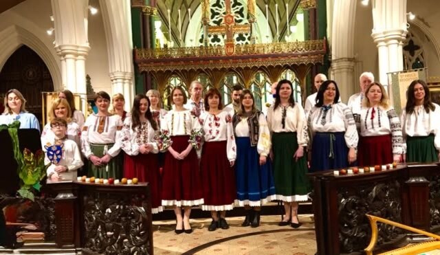The choir performing together in a Brighton church