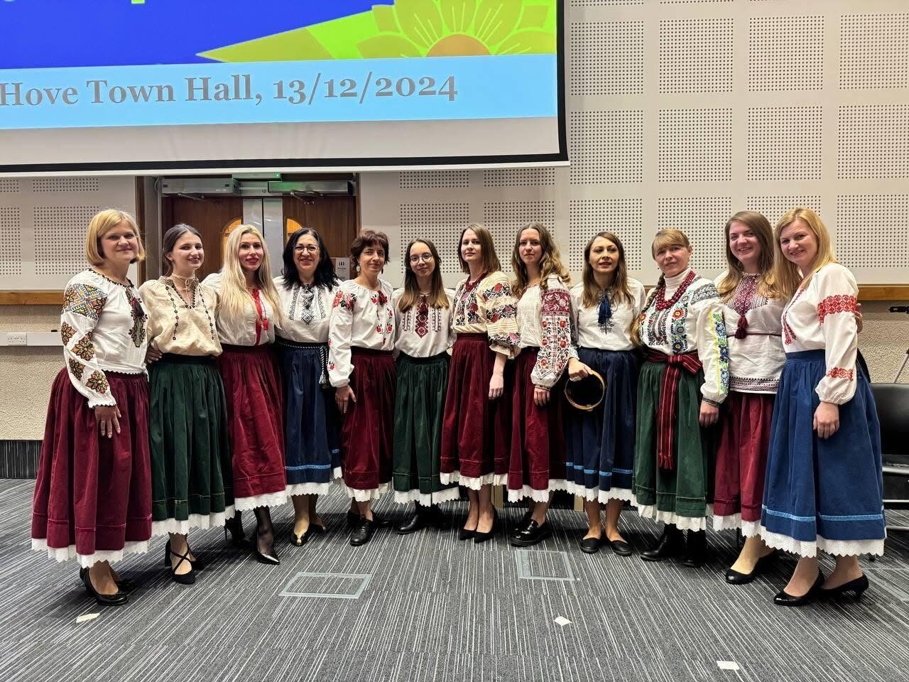 The Ukrainian Voices choir in traditional vyshyvanky at Hove Town Hall, Brighton & Hove